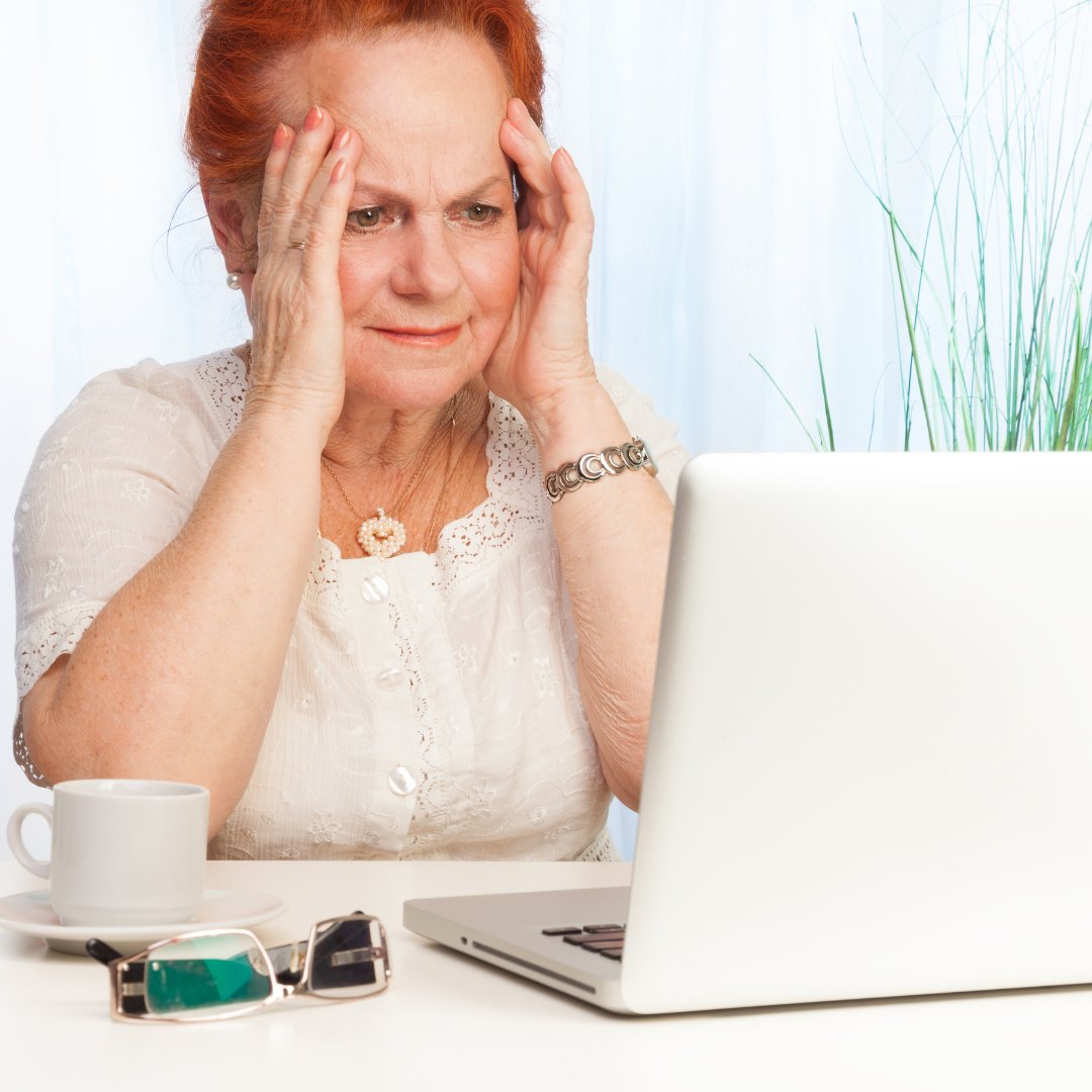 Older Person Confused At Computer